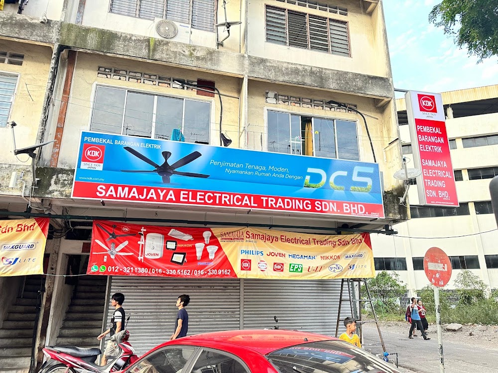 Shoplot with a blue KDK fan signboard reading Samajaya Electrical Trading Sdn Bhd and a red and yellow brand banner above a closed shutter