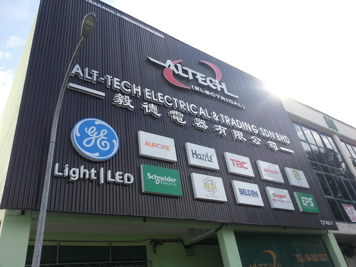 Dark shop facade with the Alt-Tech Electrical signboard and a grid of brand logos