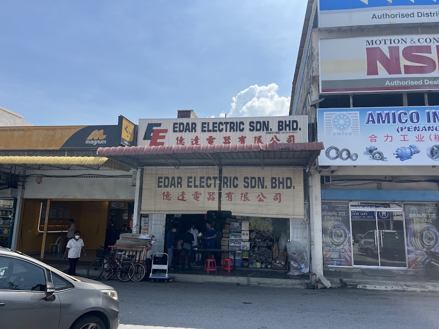 Single-storey shopfront with an Edar Electric Sdn Bhd signboard and bamboo blind