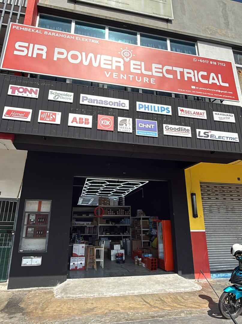 Red Sir Power Electrical fascia above a black brand board with fourteen electrical brand logos and an open shop front