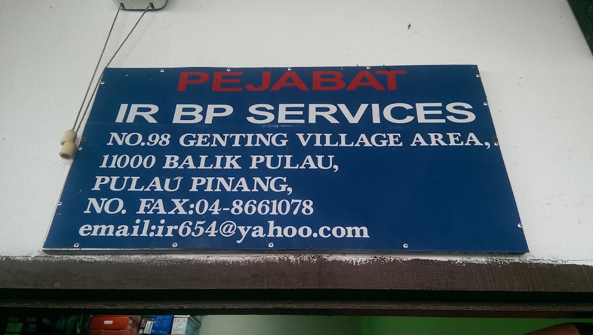 Blue signboard reading Pejabat IR BP Services, No. 98 Genting Village Area, 11000 Balik Pulau, Pulau Pinang, fax 04-8661078 and email ir654@yahoo.com